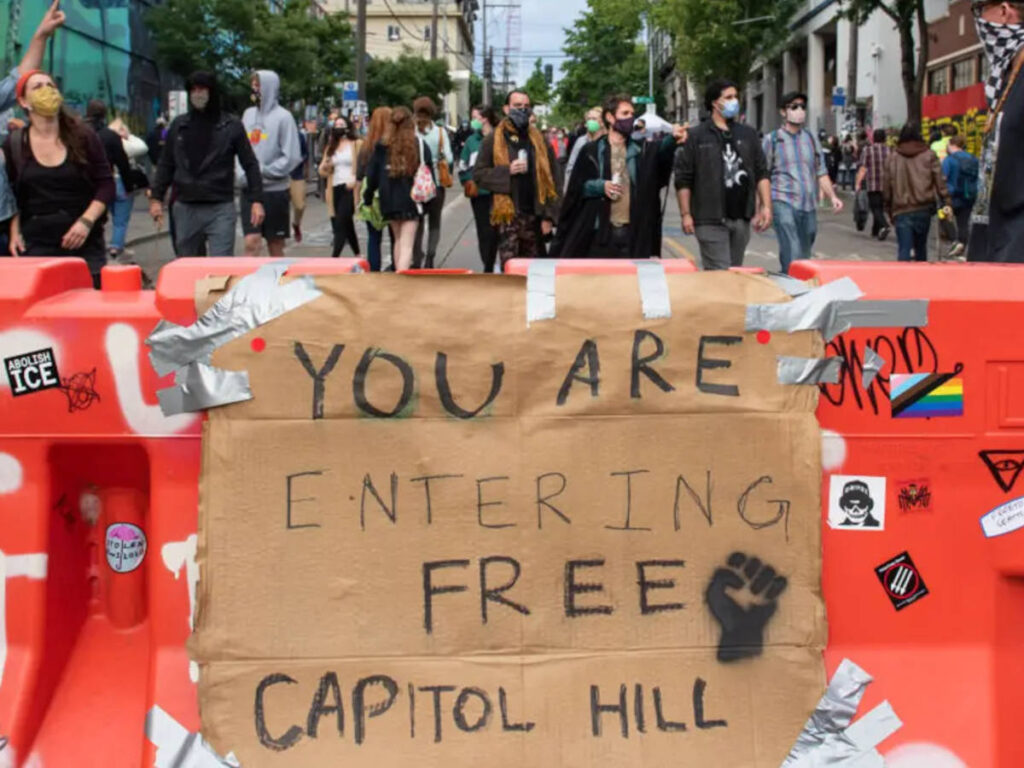Capitol Hill protest sign saying "You Are Entering Free Capitol Hill"