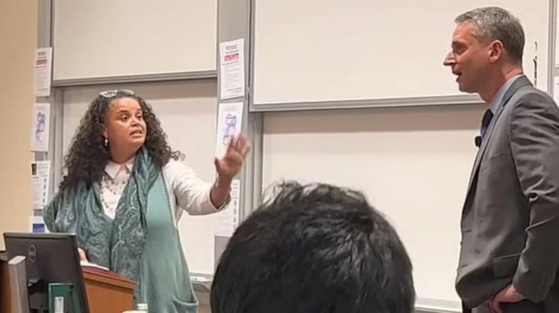 Associate Dean of Diversity, Equity, and Inclusion Tirien Steinbach lecturing Judge Kyle Duncan at Stanford Law School event