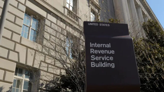 Front of Internal Revenue Service building showing IRS sign